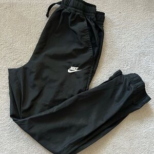 NIKE Youth warm up pants.